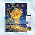 Kit complet de broderie diamant montrant une ballerine lumineuse dansant sous un grand tournesol féérique et des étoiles scintillantes