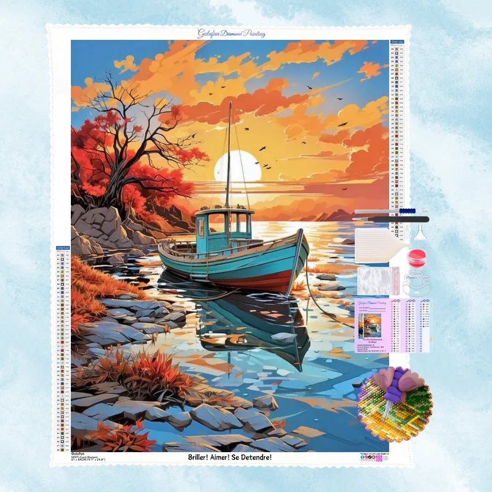 Kit complet de broderie diamant montrant un bateau en bois bleu amarré près du rivage sous un soleil couchant d'automne
