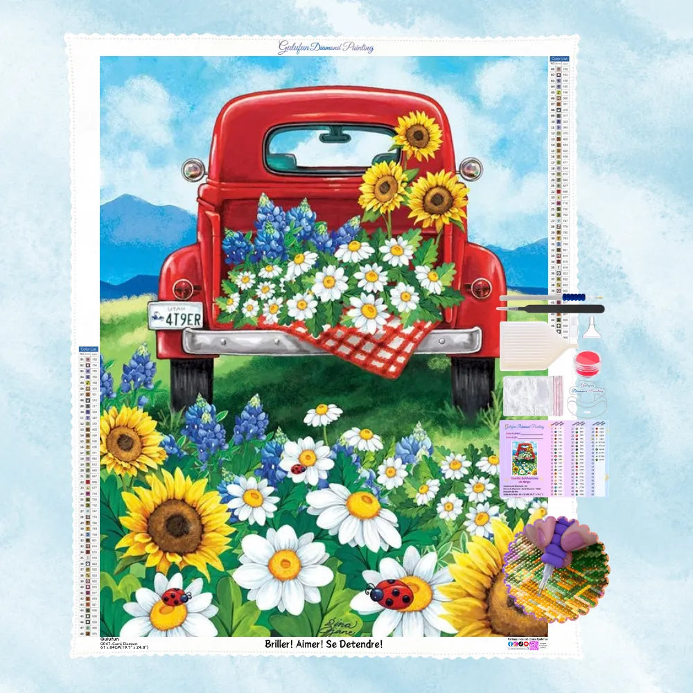 Kit complet de broderie diamant illustrant l'arrière d'un camion vintage rouge rempli de tournesols et marguerites