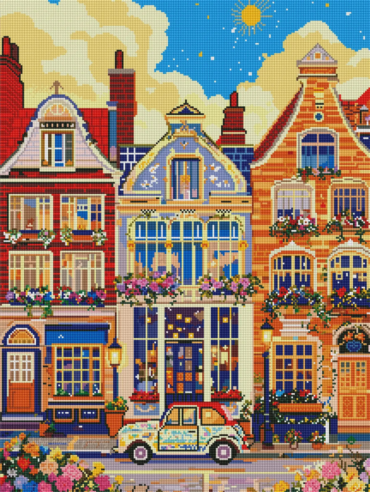 Rendu pixelisé d'un kit broderie diamant représentant des maisons colorées et une petite voiture vintage.