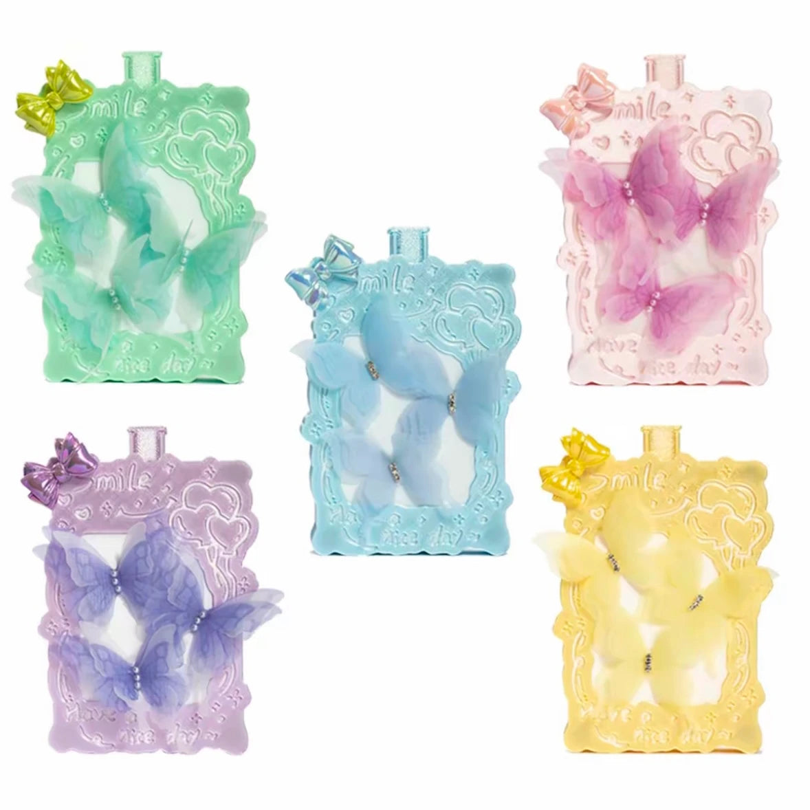 Collection de 5 plateaux papillon colorés avec couvercles magnétiques.